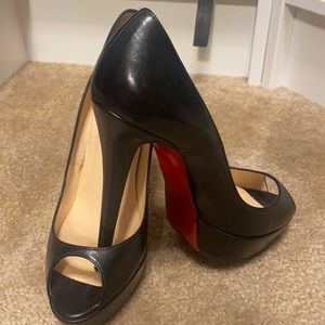 Black leather Christian Loubs black heels
